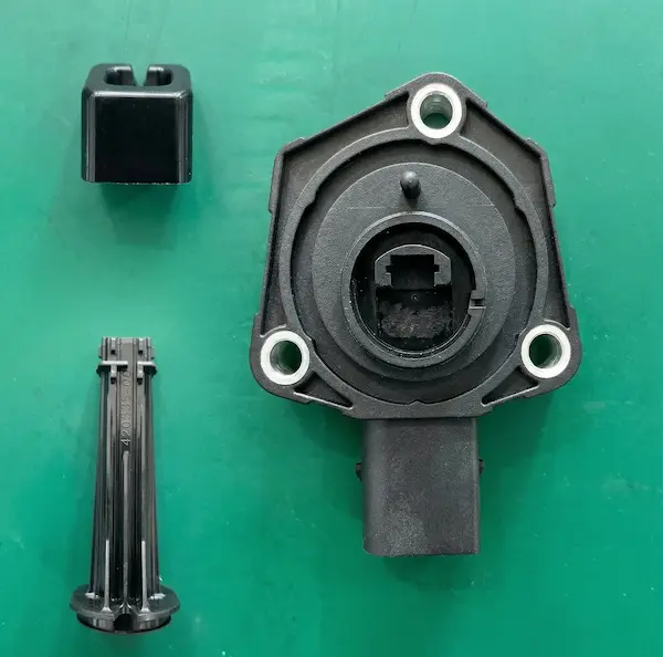 An engine sensor housing made from premium engineering plastic
